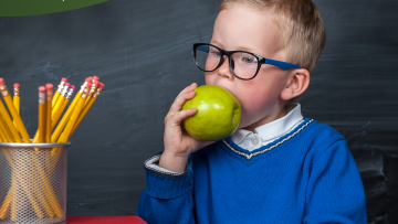 Kid eating apple